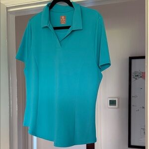 Ben Hogan Women's fitted golf shirt in turquoise color
